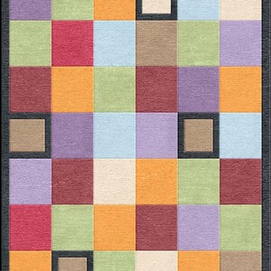 May include: A rectangular area rug featuring a grid of multicoloured squares in shades of orange, red, purple, light green, light blue, beige, and cream. Several squares are outlined with a thick black border, and the entire rug has a black frame.