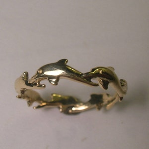 14 kt Solid Yellow Gold Band With Seven Graceful Swimming Dolphins In A Circle