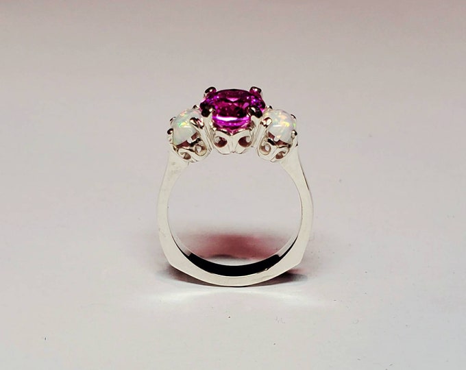 Sterling silver with10x8mm oval Pink  Tourmaline and opal 3 stone ring