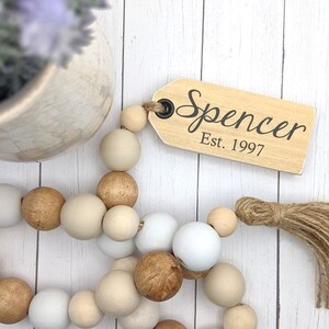 rustic farmhouse decor- wedding gift last name established date beads neutral family name tiered tray Beaded garland tag