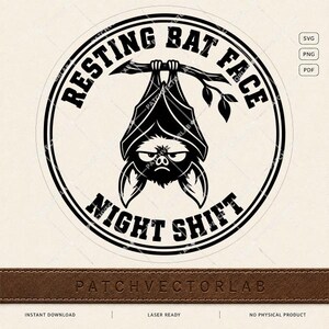 May include: A circular black and white graphic design featuring a bat hanging upside down from a branch. The text RESTING BAT FACE is arched above the bat, and the text NIGHT SHIFT is arched below. The design includes small SVG, PNG, and PDF labels.