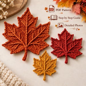 May include: Three crocheted maple leaves in orange, dark red, and yellow. The image includes text labels: PDF Pattern, Step by Step Guide, and Detailed Photos. The leaves feature visible yarn stitching and raised central veins in a leaf shape.