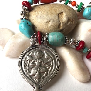 Gorgeous colourful necklace with a Rahjastani silver pendant representing Hanuman ,symbol of Courage.