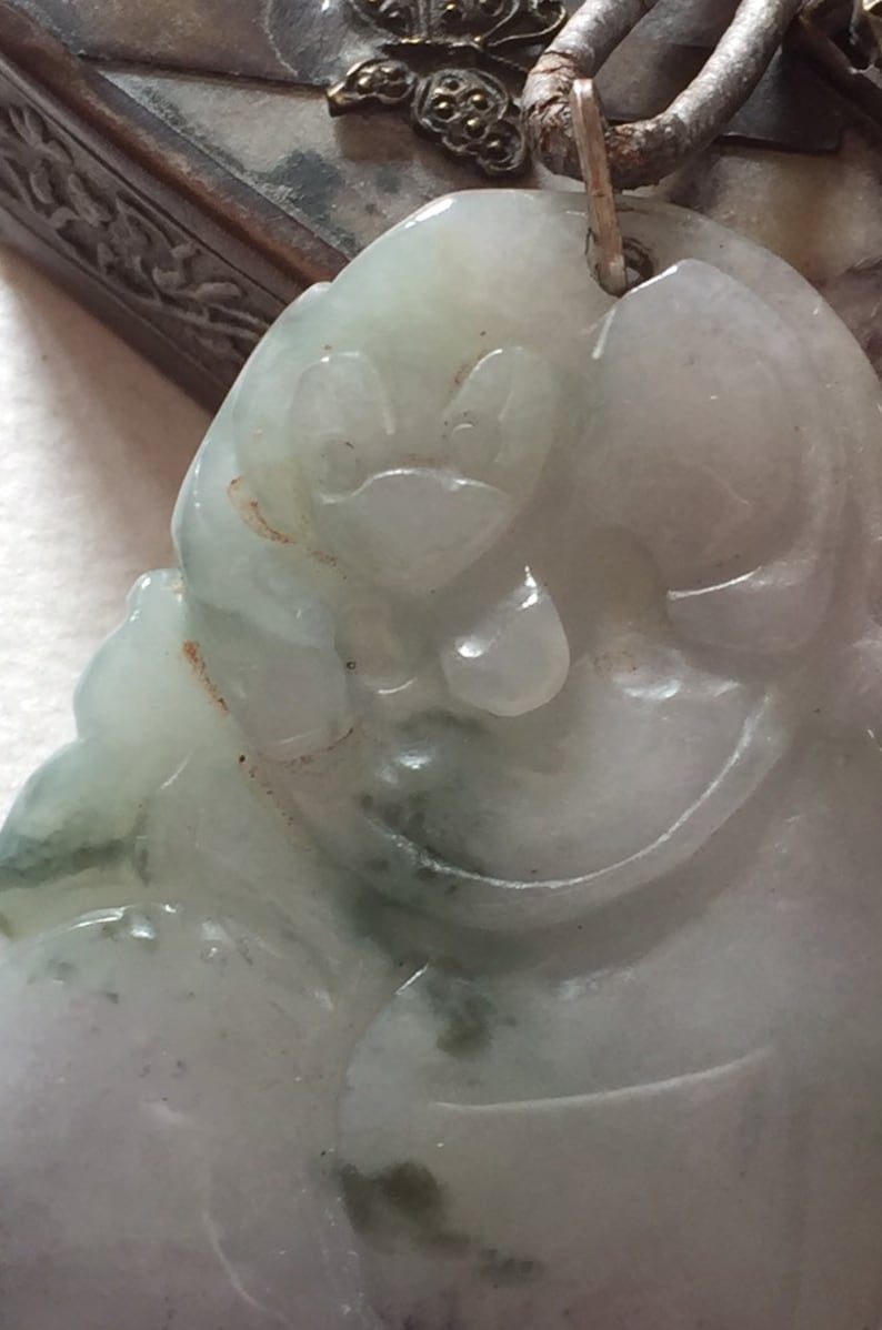 The Monkey and the Peach exquisite jade pendant.