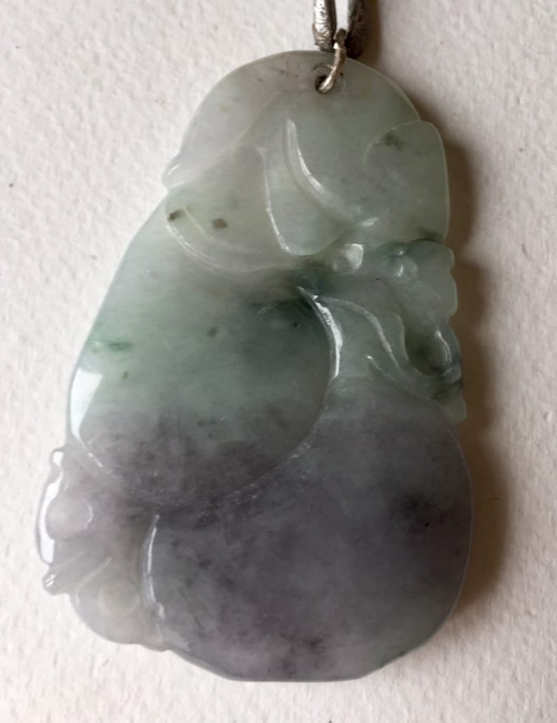 The Monkey and the Peach exquisite jade pendant.
