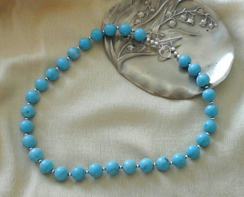 RARE superb turquoise beads and sterling silver beads.