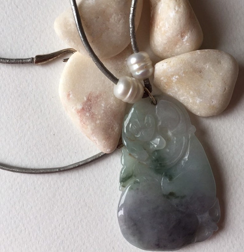 The Monkey and the Peach exquisite jade pendant.