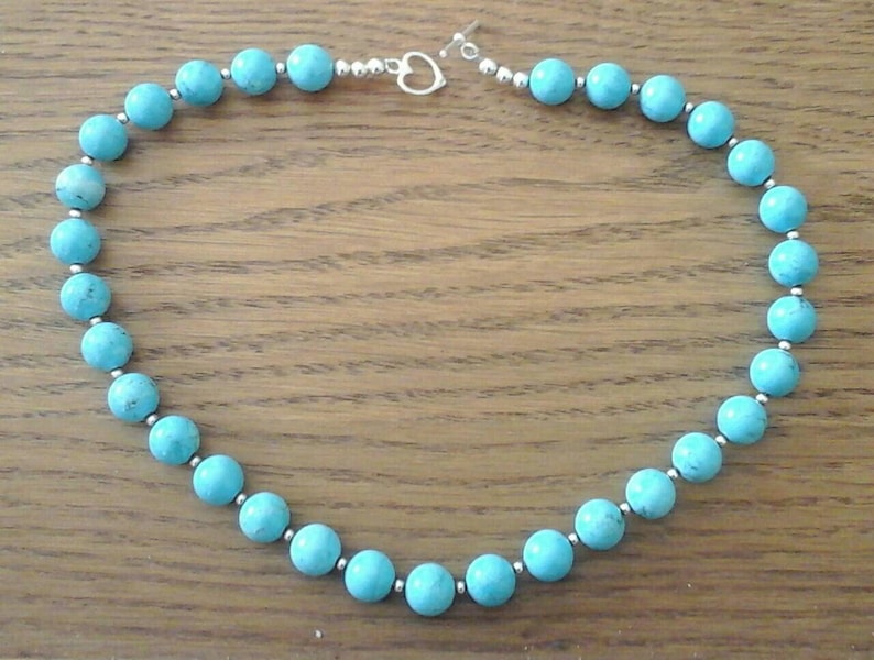 RARE superb turquoise beads and sterling silver beads.