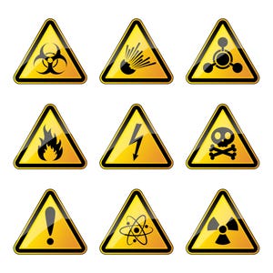 May include: A collection of nine yellow triangular hazard warning signs with black borders and black icons. The symbols represent biohazard, explosion, chemical weapon, fire, high voltage, skull and crossbones, exclamation mark, atom, and radiation.