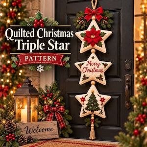 May include: A hanging wall decoration featuring three cream-colored quilted stars connected by wooden beads. The top star has a red poinsettia, the middle star reads Merry Christmas, and the bottom star features a green Christmas tree design.