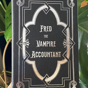 The Utterly Uninteresting and Unadventurous Tales of Fred, the Vampire Accountant - Handmade Leatherbound Collector’s Edition