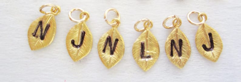 Make a personalized gift Add an initial charm Personalized Initial Charm Gold leaf initial charm Hand Stamped Initial Leaf muse411
