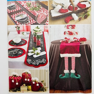 May include: Simplicity pattern 8032 features various holiday-themed home decor items. The image showcases table runners, placemats, and decorative accents in red, white, and green. The pattern includes instructions for creating festive holiday decorations.
