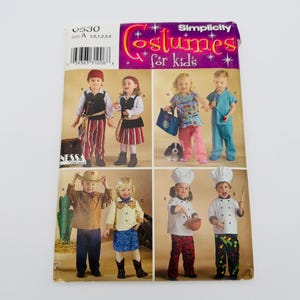 May include: A Simplicity sewing pattern envelope for kids' costumes, model 0530, size A. The front displays photographs of children wearing various outfits including pirate, doctor, cowboy, cowgirl, and chef costumes with text labels.