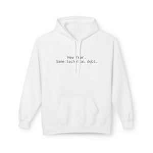 May include: A white hooded sweatshirt featuring a front kangaroo pocket and long sleeves. The chest area displays the black printed text: New Year. Same technical debt. The garment is constructed with a drawstring hood and ribbed cuffs.