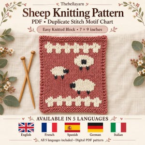 May include: A square knitted block measuring 17.78 by 22.86 cm with a dusty rose background, featuring white sheep motifs and white fence borders. Two wooden knitting needles are placed to the left. The text reads Thebellayarn Sheep Knitting Pattern.