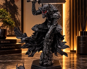 May include: A detailed figurine of a warrior in dark, textured armor with glowing red eyes, holding a large rectangular sword above the head. The figure stands on a rocky base with a flowing cape, accompanied by a separate matching helmet piece.