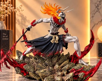 May include: A dynamic anime character figurine featuring a white skeletal mask with horns, vibrant orange hair, and a muscular grey body. The figure wears a black skirt with a white sash, holds a black sword, and stands on a jagged, rocky base with red flame effects.