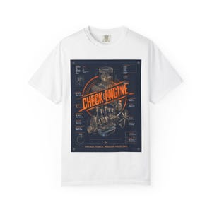 May include: A white short-sleeve t-shirt featuring a dark blue rectangular graphic on the chest. The graphic displays technical engine diagrams, the orange text "CHECK ENGINE", and the phrase "VINTAGE POWER. MODERN PROBLEMS." at the bottom.