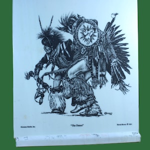 May include: Black and white print of a Native American dancer in traditional attire, including a feathered headdress, shield, and fringed leggings. The artwork is titled "The Dance" and signed by Bernie Brown.