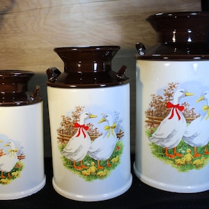 25Percent Off  Three Piece Canister Set with Milk Can Design and two Geese or Ducks on Front