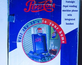 Teléfono fijo de pared o soporte de Pepsi