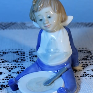 20Percent Off   Vintage NAO Figurine Made by Lladro &quot;I&#39;m Full&quot; dated 1988