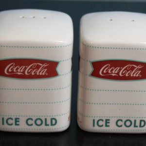 20Percent Off   Square Coca Cola Salt and Pepper Shakers with Fishtail design