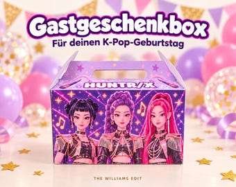 May include: A rectangular cardboard gift box featuring a purple and pink graphic of three stylized figures in stage outfits. The text HUNTR/X is printed on the front, with musical notes and stars. The box has a handle and a top flap.