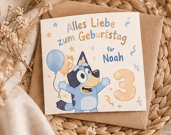 May include: A square birthday greeting card featuring a blue cartoon dog character, a light blue balloon, and the number three in a soft orange color. The text reads Alles Liebe zum Geburtstag für Noah in blue and orange.