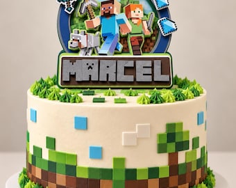 May include: A round cake with off-white frosting, decorated with green and brown pixelated squares at the base and green piped frosting borders. A Minecraft-themed topper features the name MARCEL, the number 9, and character cutouts.