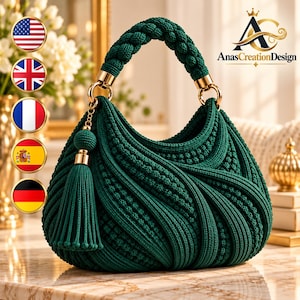 May include: A dark green crocheted handbag featuring a braided handle, gold-tone metal rings, and a matching tassel charm. The bag has a textured, ribbed surface pattern and is branded with the text AnasCreationDesign in the upper corner.