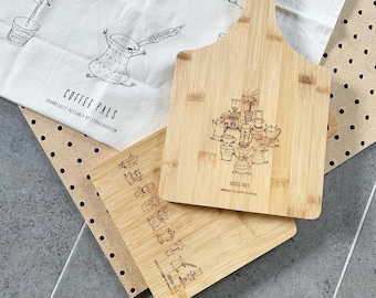 Coffee Pals Paddle Board - handdrawn illustrations laser etched onto bamboo board. Serving platter design.