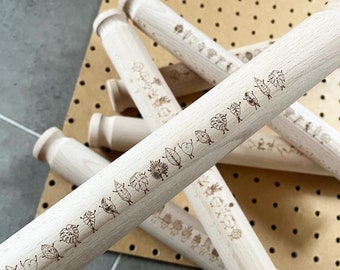 SECONDS Jolly Leaf Pals Rolling Pin - handdrawn illustrations laser etched onto a rolling pin. Leaf design.