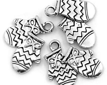 May include: Five silver mitten charms with a zig-zag pattern. The charms have a loop at the top for attaching to a necklace or bracelet. Antique Silver.