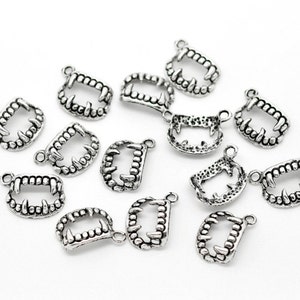 10 pieces Antique Silver Vampire Teeth Charms