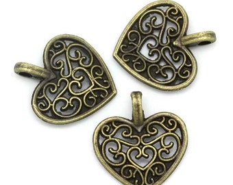 10 pieces Antique Bronze Pattern Carved Hollow Heart Charms