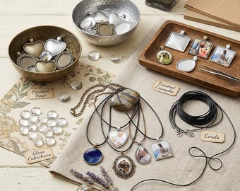 May include: A jewelry making kit featuring metal pendant trays in heart and square shapes, clear glass cabochons, black and metallic cords, and finished photo pendants. Includes labels for Pendant Trays, Finished Examples, and Cords.