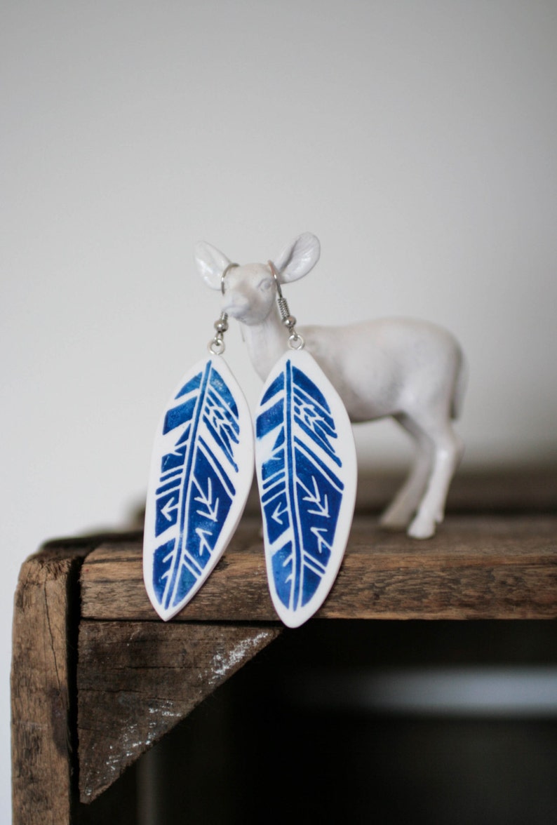 Feather hanging earrings Clearance