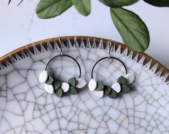 Wreath Earrings with eucalyptus green and white leaves. Made in Finland.