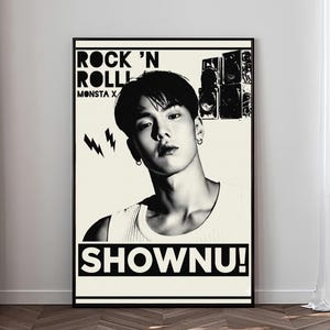 May include: A rectangular poster featuring a black and white graphic illustration of a person. The text reads ROCK 'N ROLL! MONSTA X and SHOWNU! The design includes two lightning bolt icons and a stack of speakers in the upper right corner.