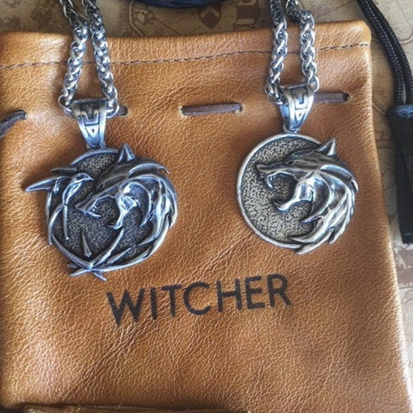 Nuovi medaglioni premium Witcher White Wolf e Trio con custodie in pelle