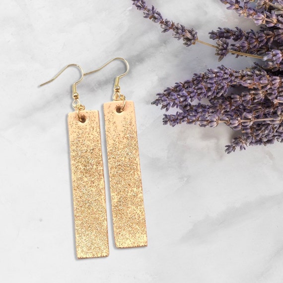 gold and white genuine leather earrings! Sparkly