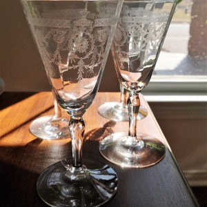 Set of Four (4) Heisey Glass Water Goblets / Wine Glasses with Zodiac Etch