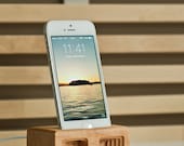 Acoustic iPhone 5 dock in Curly Maple - Amplifies sound through unique acoustical pockets .