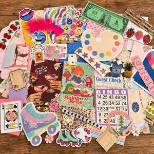 May include: A collection of colorful paper ephemera, stickers, and cutouts including a Rainbow Brite card, a bingo board, a green one-dollar bill, playing cards, roller skate stickers, a paint palette, and various floral and food-themed decorative items.