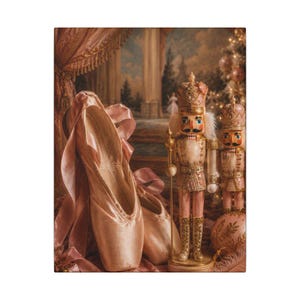 May include: A pair of pale pink satin ballet slippers with long ribbons alongside two decorative nutcracker figures wearing ornate crowns and gold-trimmed uniforms, standing near a round, textured ornament in a soft, warm-toned setting.