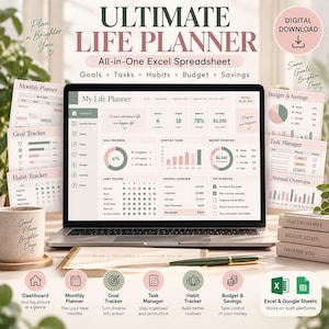 May include: A laptop screen displays an Ultimate Life Planner Excel spreadsheet with sections for goals, tasks, habits, and budget. The interface features soft pink and green accents, charts, and lists. Surrounding the laptop are printed planner pages, a mug, a pen, and a notebook.