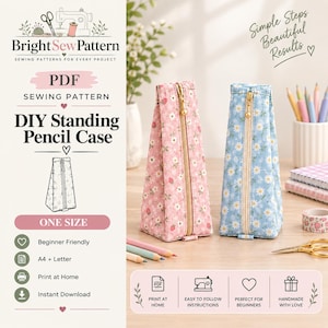 May include: A PDF sewing pattern for a DIY standing pencil case by Bright Sew Pattern. The image displays two fabric pencil cases, one pink with a floral and strawberry print and one blue with a daisy print, both featuring gold zippers.