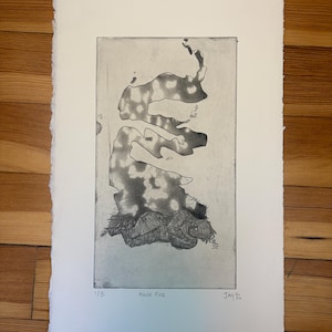 May include: A black and white etching on textured paper featuring a figure lying down beneath a large, abstract plume of smoke. The print is titled House Fire, numbered 1/3, and signed by the artist with the date 2006 in the bottom margin.